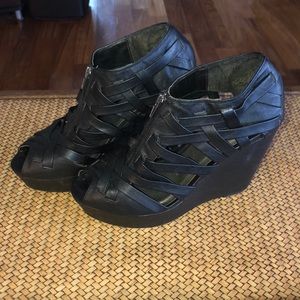 Cute black wedge heels.